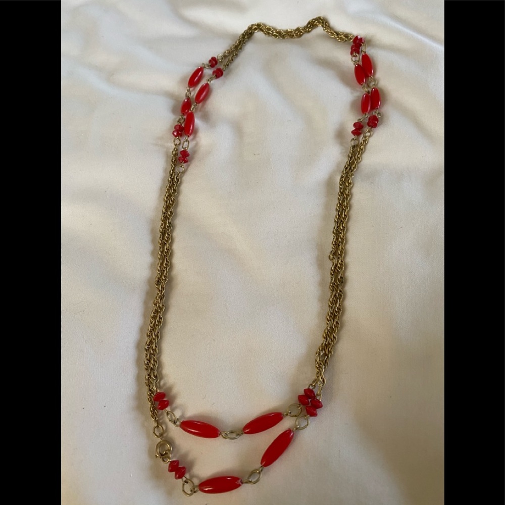 Coral long necklace possibly 24k